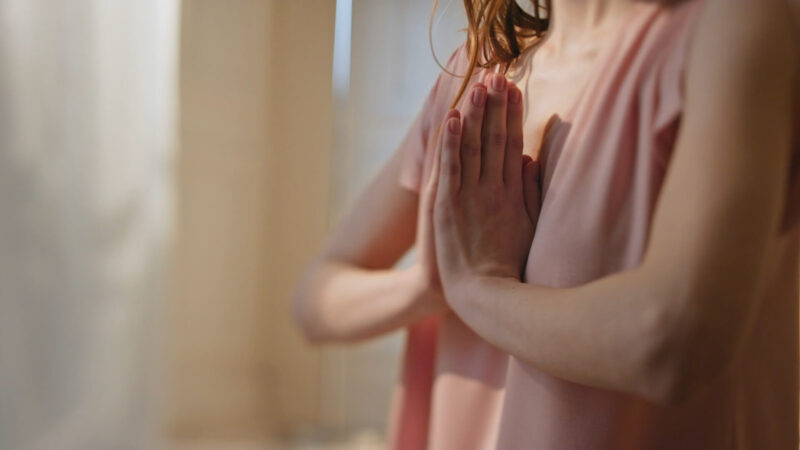 The woman practices Mindfulness-Based Stress Reduction